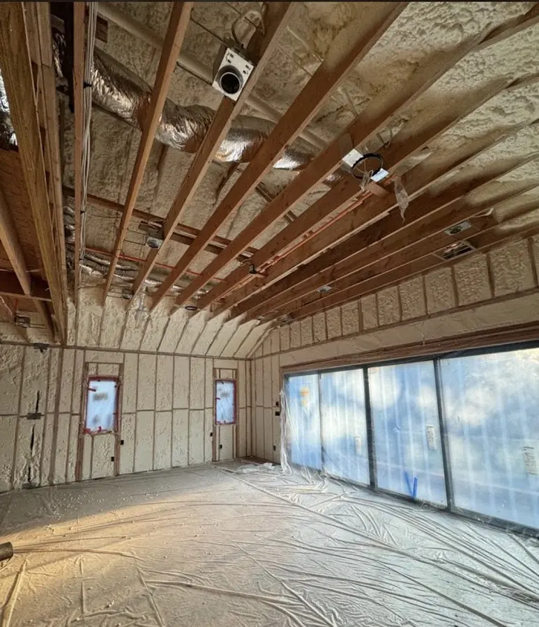 Interior walls and ceiling insulated with spray foam during new construction in Jennings